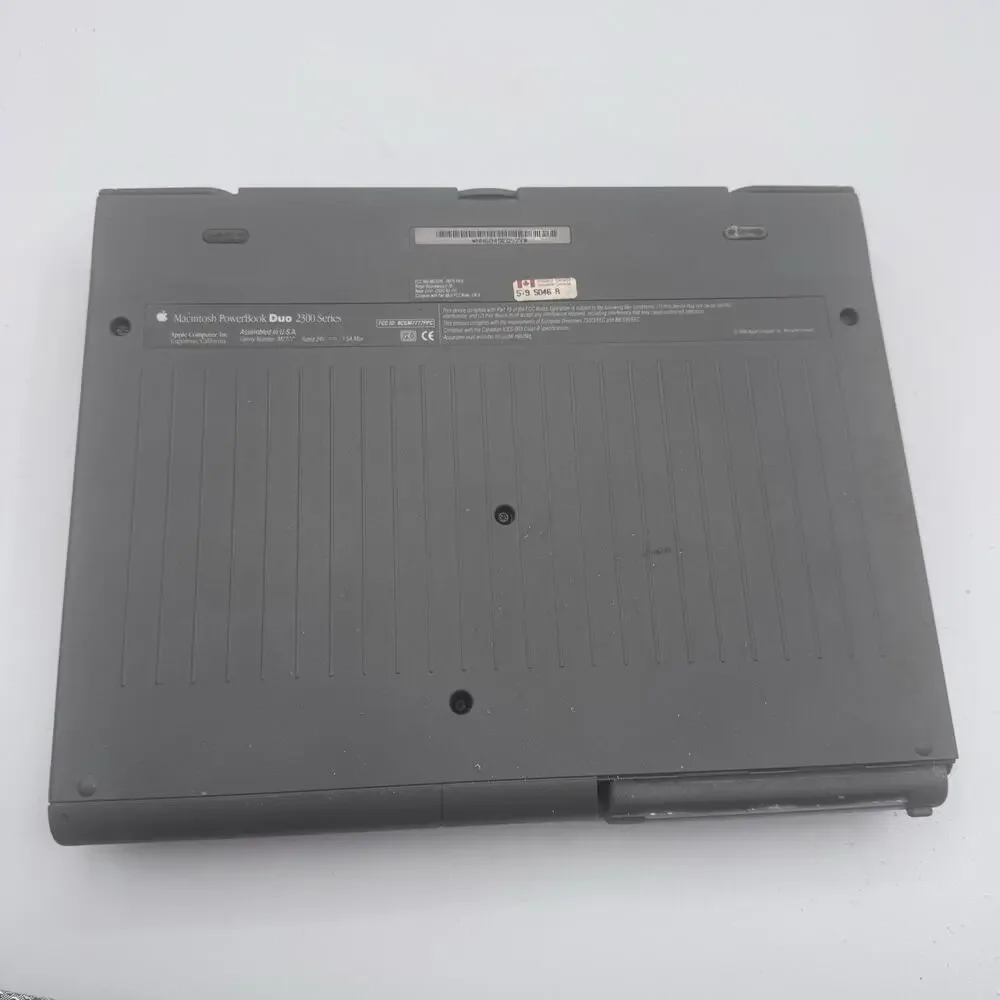 Vintage Apple Macintosh PowerBook Duo 2300c PowerPC Laptop Powers On AC Adapter
